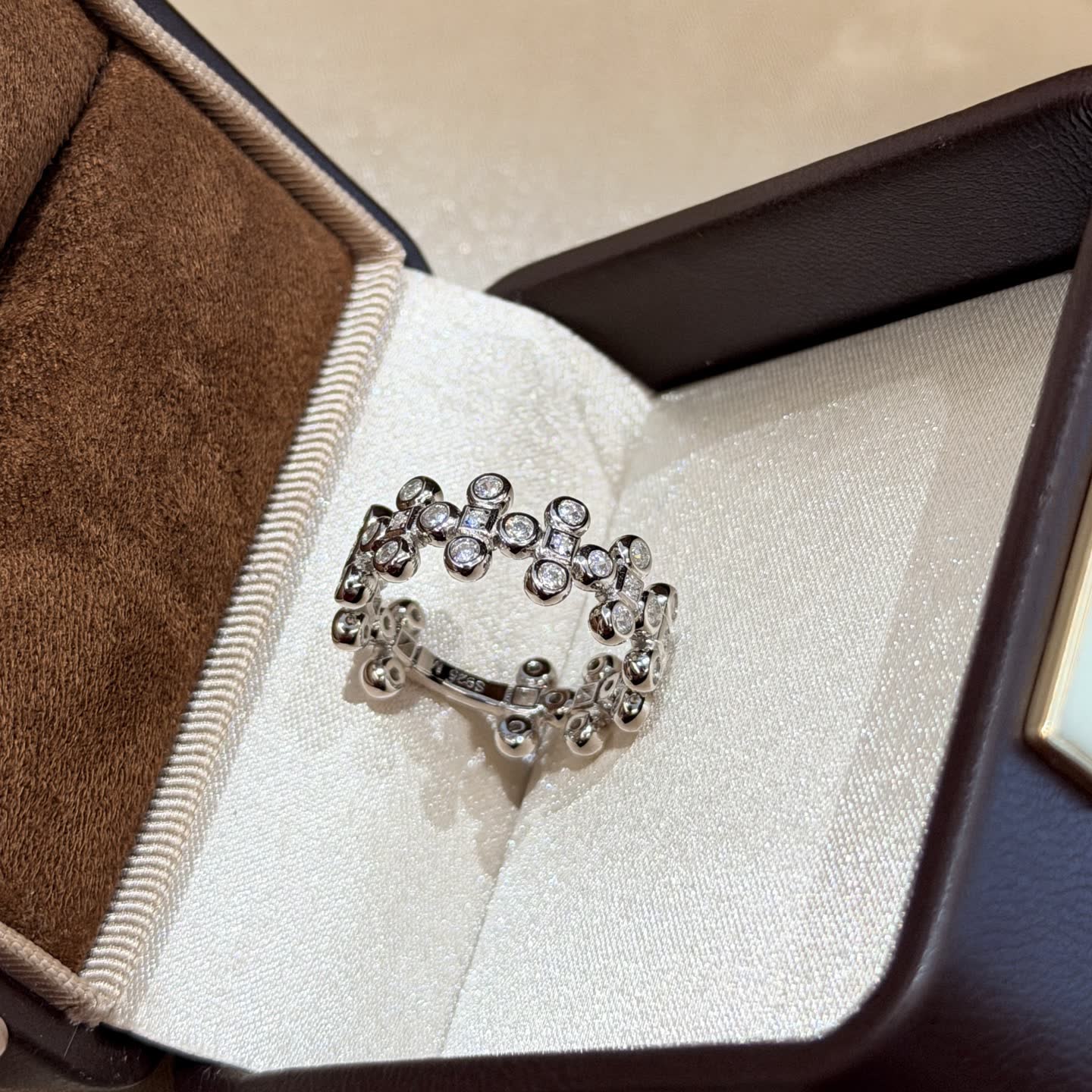 Van Cleef & Arpels Elegant Silver Ring with Cubic Zirconia Stones